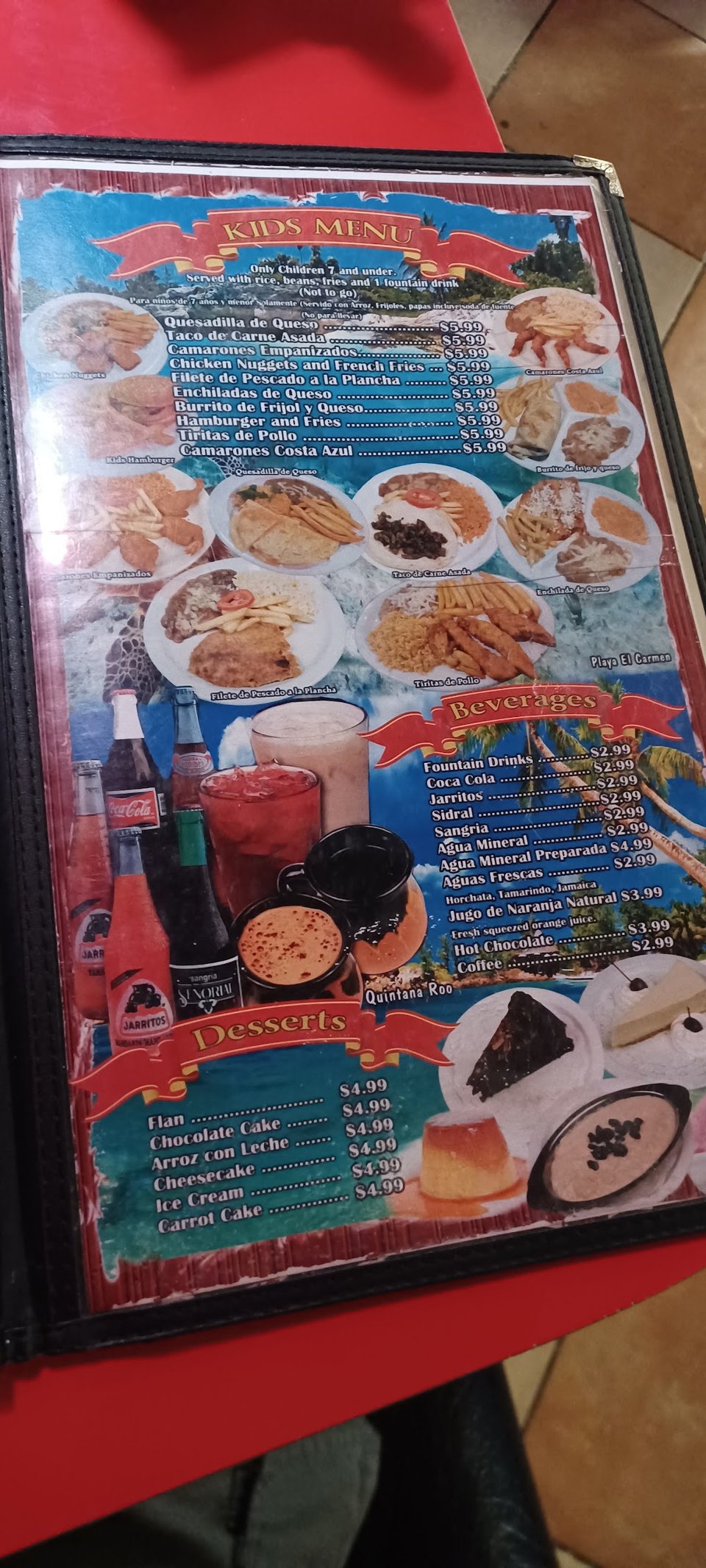 Close-up of a seafood restaurant menu.